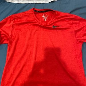 Brand new without tags Nike Dri-fit shirt. Size: Large Color: University Red